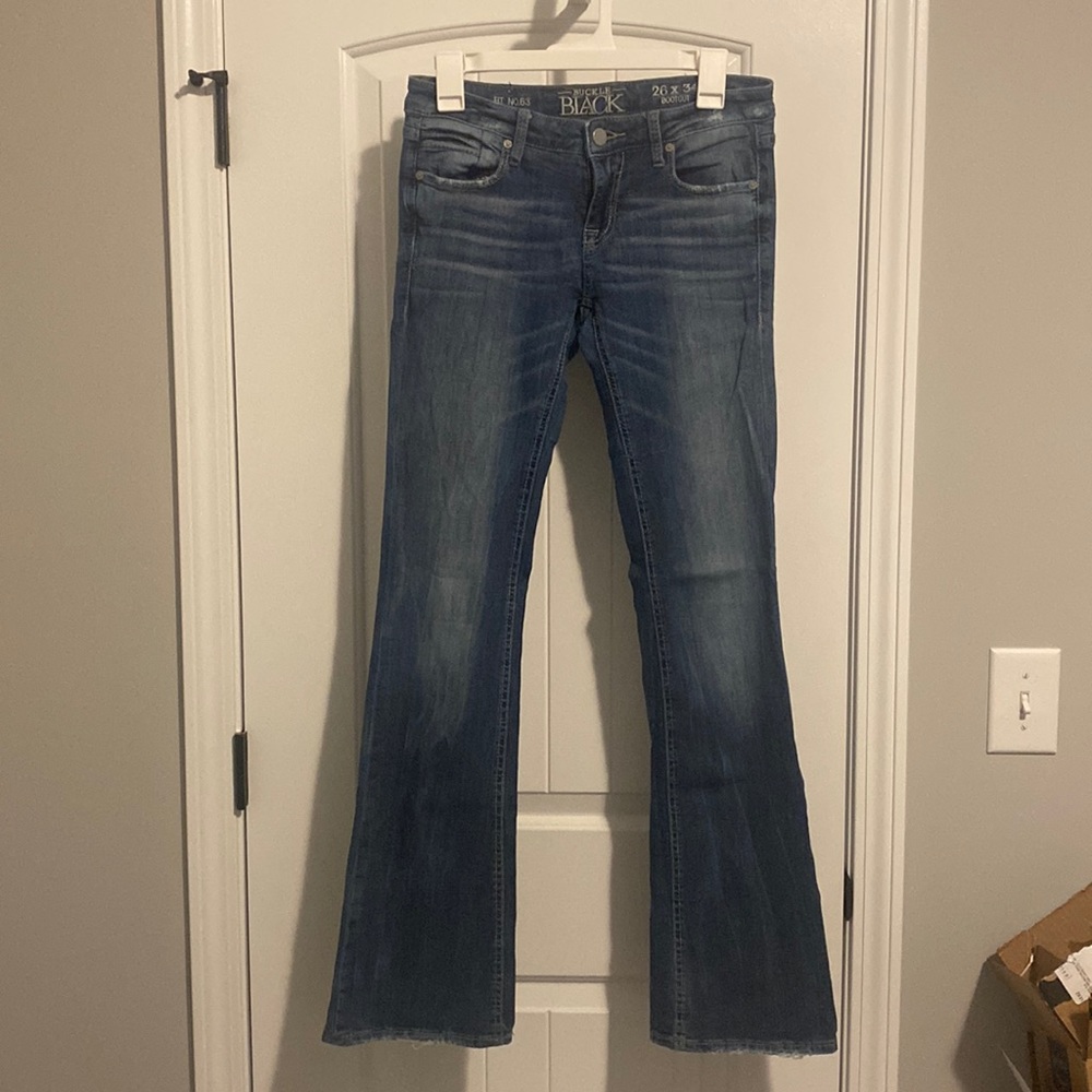 Buckle black boot cut jeans